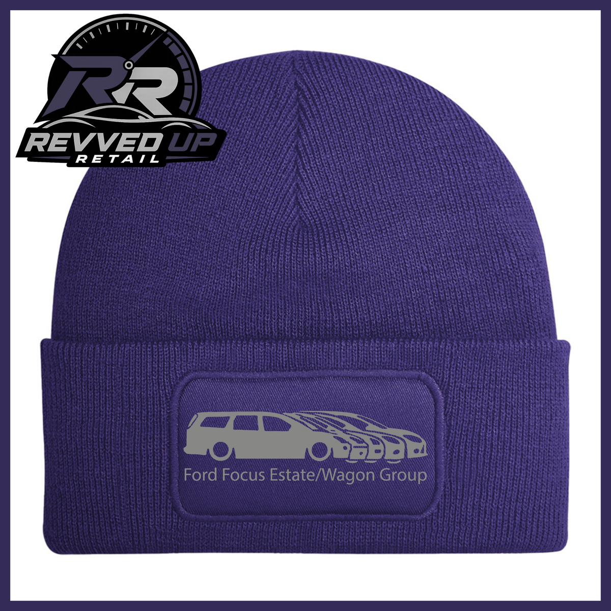 A purple knit beanie with a folded cuff featuring a rectangular patch that reads 'Ford Focus Estate/Wagon Group' with a grey car graphic. The Revved Up Retail logo is displayed in the top-left corner.