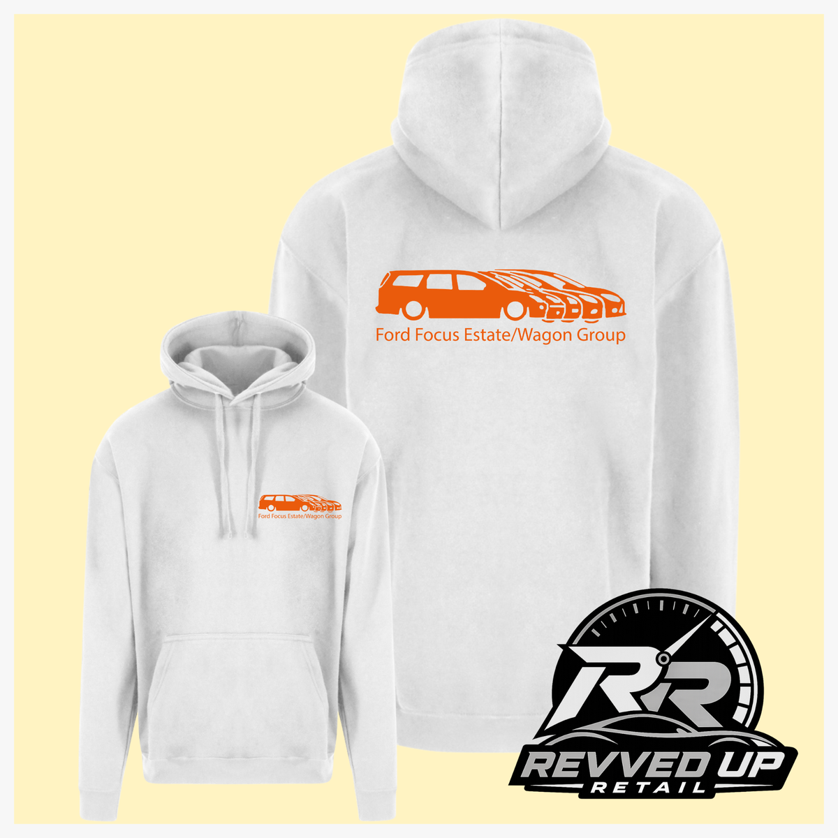 Two white pullover hoodies shown on a pale yellow background: a larger back view of the hoodie with an orange car graphic and the text 'Ford Focus Estate/Wagon Group' on the back, and a smaller front view of the hoodie with a matching orange chest graphic. A Revved Up Retail logo appears in the bottom right corner.