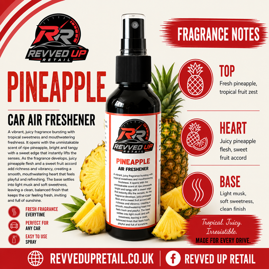 Revved Up Pineapple Car Air Freshener bottle centered on a promotional graphic with fragrance notes, pineapple illustrations, and brand text. The product is a black-and-white spray bottle with a white label featuring red and black branding.