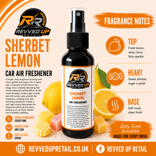 Revved Up Sherbet Lemon Car Air Freshener bottle on a warm beige promotional background with orange text blocks, fragrance notes, and fruit illustrations. The bottle is dark amber with a black spray top and a cream-and-orange label.