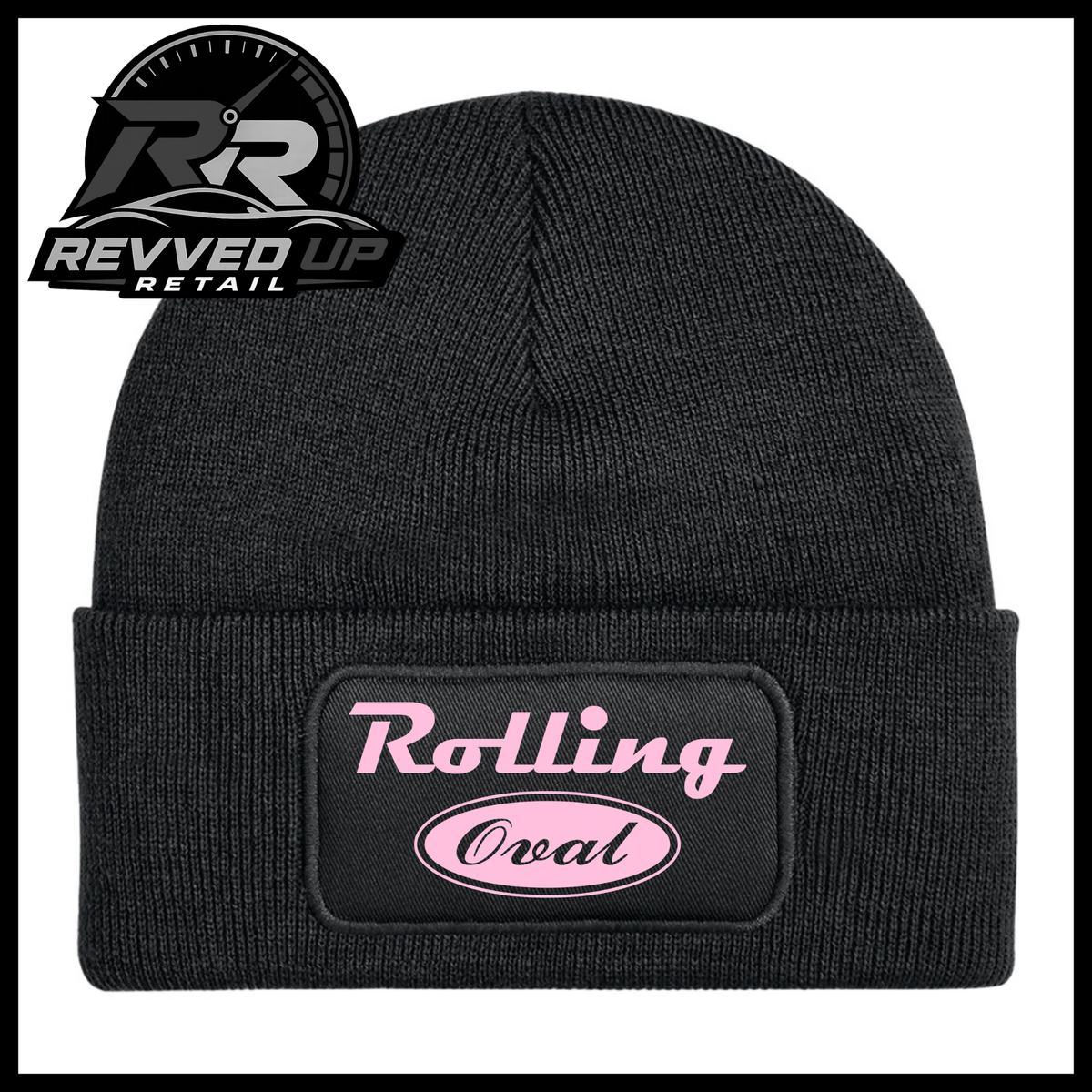 A black ribbed knit beanie with a folded cuff featuring a rectangular patch that reads 'Rolling Oval' in pink. The Revved Up Retail logo is visible in the top-left corner.