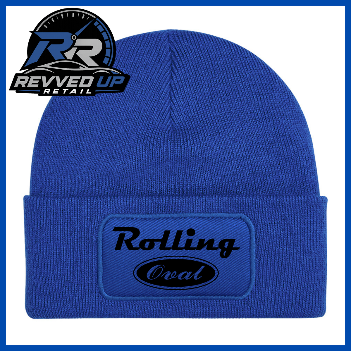 A royal blue ribbed knit beanie with a folded cuff featuring an oval patch that reads 'Rolling Oval' in black. A Revved Up Retail logo is displayed in the top-left corner.