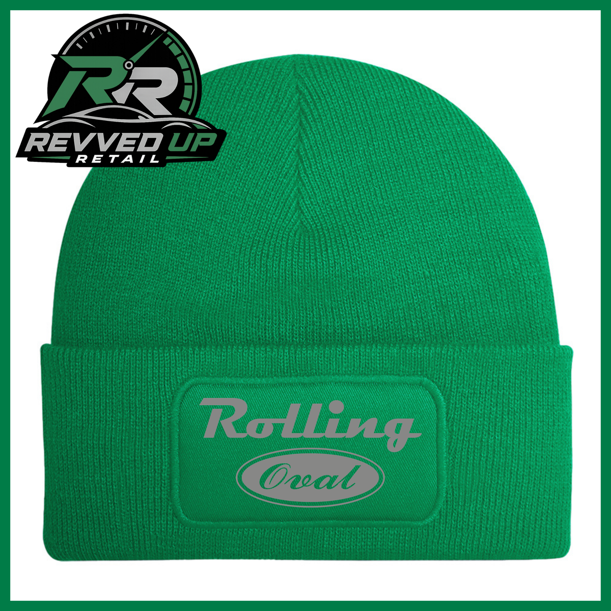 A green ribbed knit beanie with a cuffed brim featuring an oval patch that reads 'Rolling Oval' in grey. A Revved Up Retail logo is visible in the top-left corner.