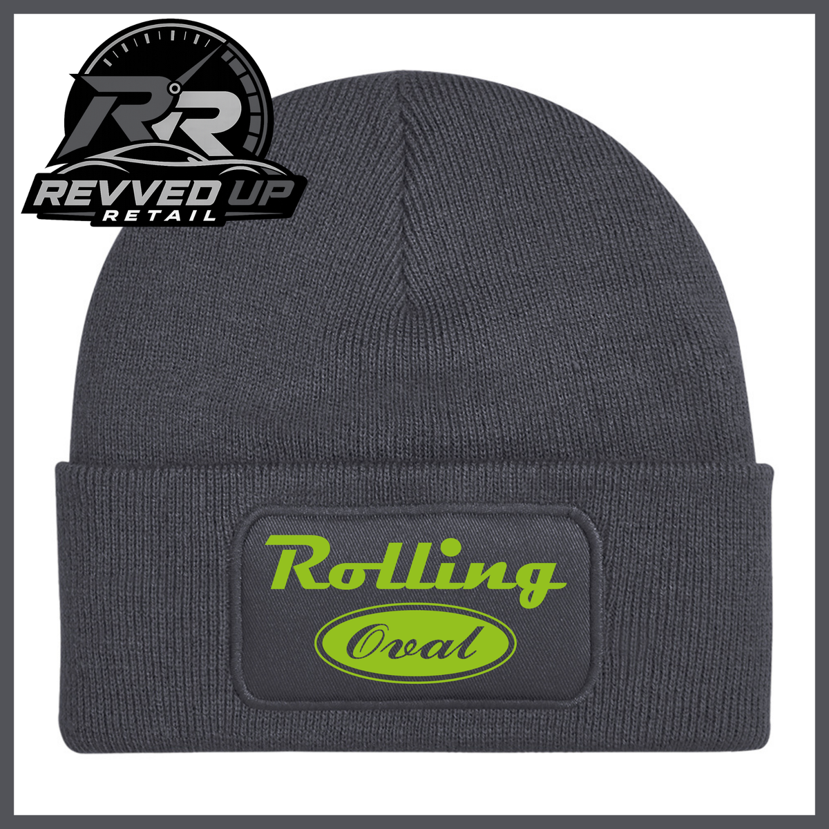 A dark grey ribbed knit beanie with a folded cuff featuring a black patch that reads 'Rolling Oval' in green. A Revved Up Retail logo is visible in the top-left corner.
