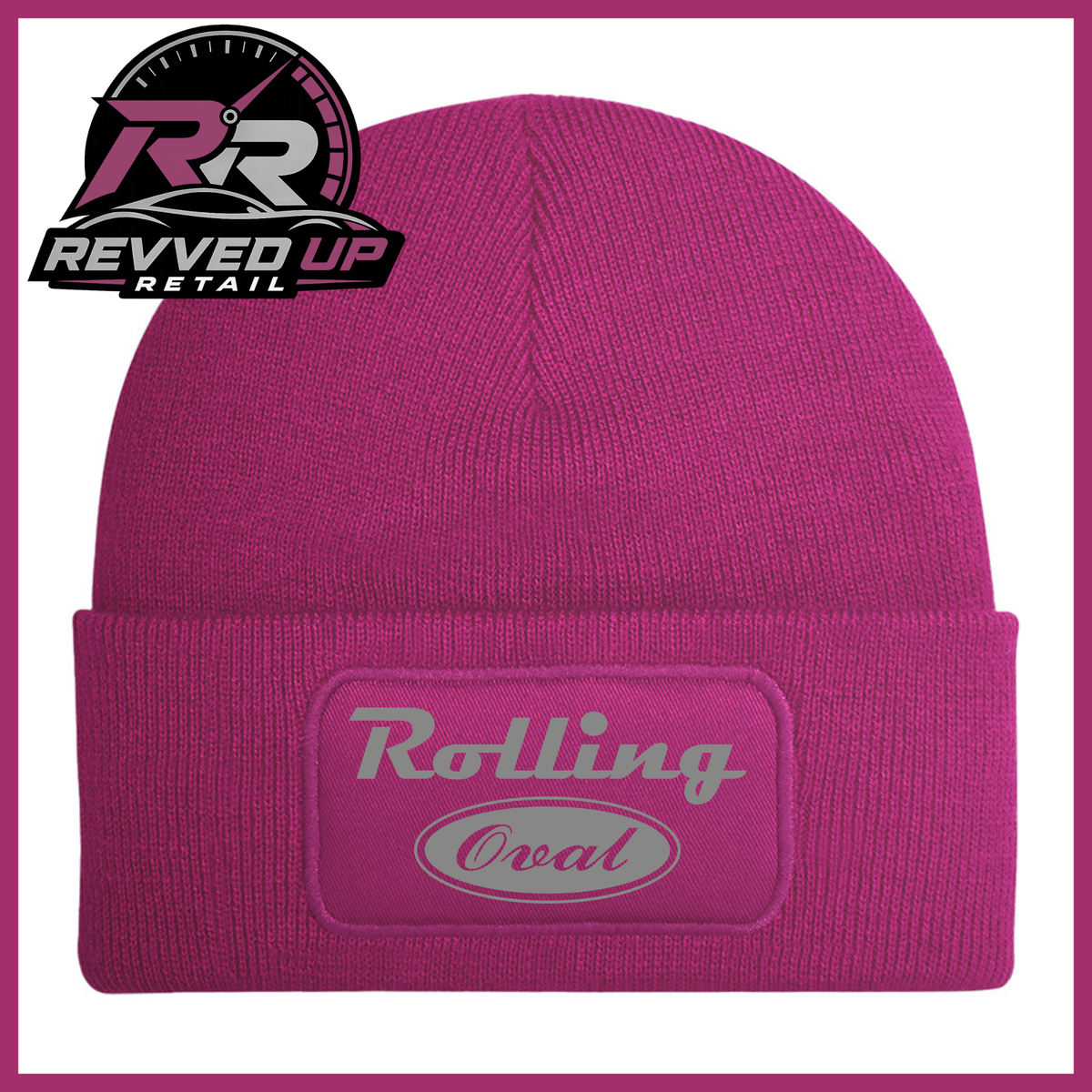 A bright pink ribbed knit beanie hat with a cuffed brim, featuring a rectangular patch on the front that reads 'Rolling Oval' in grey. A Revved Up Retail logo is visible in the top-left corner.