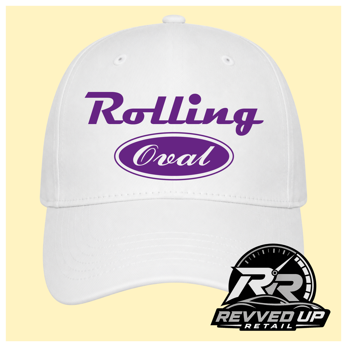 A white baseball cap with purple text reading 'Rolling Oval' on the front, shown against a pale yellow background with a Revved Up Retail logo in the bottom right corner.