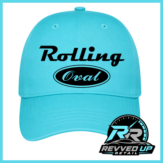 A light blue baseball cap with 'Rolling Oval' printed on the front in black and white. The image has a turquoise border and a Revved Up Retail logo in the bottom right corner.