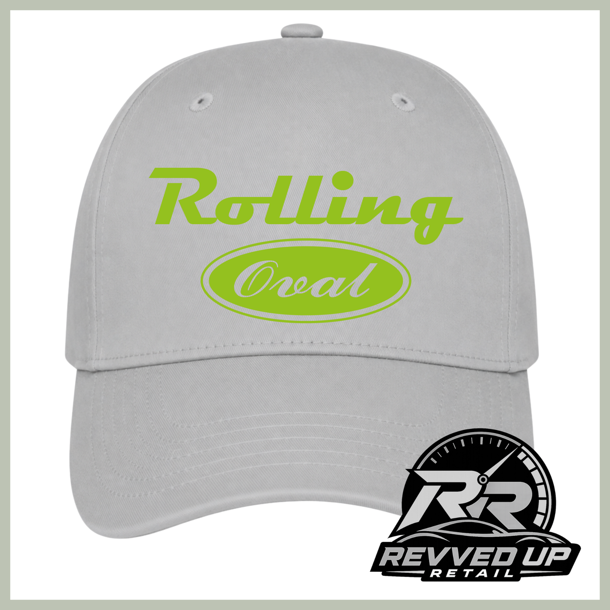 A light gray baseball cap with a bright green 'Rolling Oval' logo on the front. A black and white 'Revved Up Retail' logo is positioned in the bottom right corner.