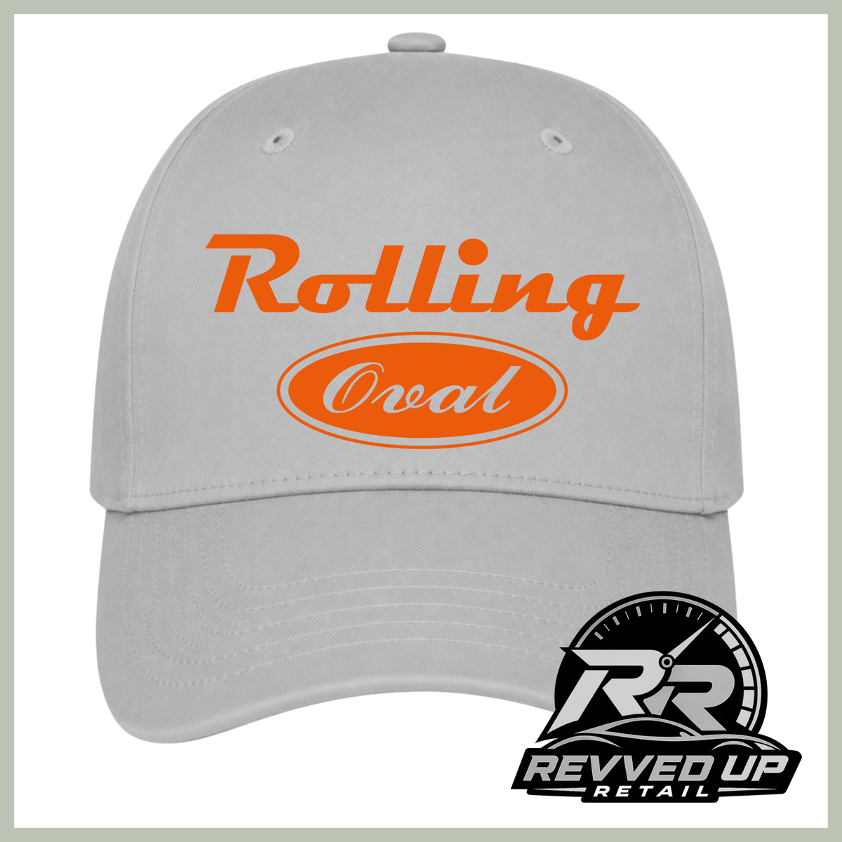 A light gray baseball cap with orange text reading 'Rolling Oval' on the front, shown against a white background with a Revved Up Retail logo in the bottom right corner.