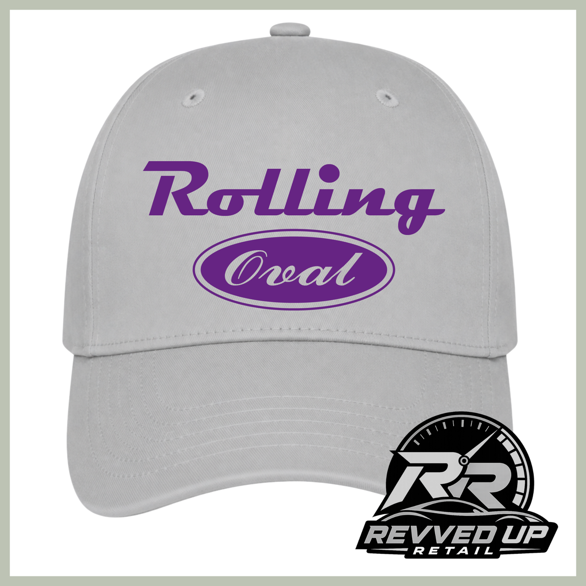 A light gray baseball cap with purple text reading 'Rolling Oval' on the front, shown on a white background with a Revved Up Retail logo in the bottom right corner.
