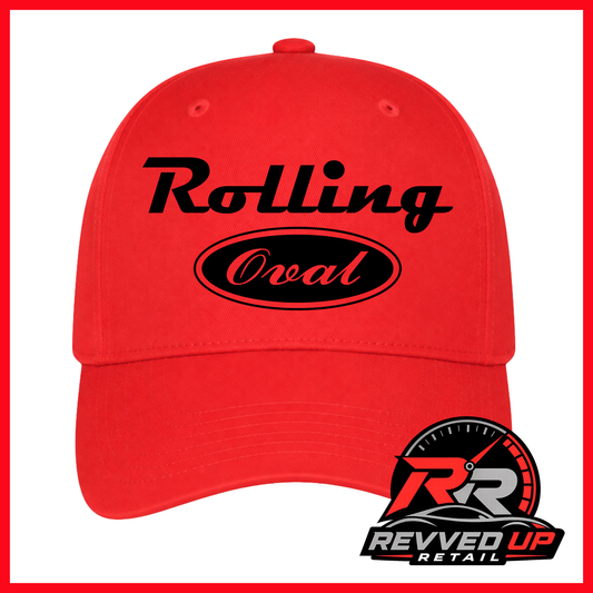 A bright red baseball cap with black text reading 'Rolling Oval' on the front, shown against a white background with a red border. A Revved Up Retail logo is visible in the bottom right corner.