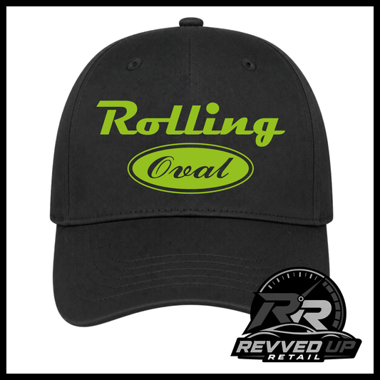 A black baseball cap featuring a green 'Rolling Oval' logo on the front. The image is framed with a black border, and a 'Revved Up Retail' logo watermark is visible in the bottom right corner.