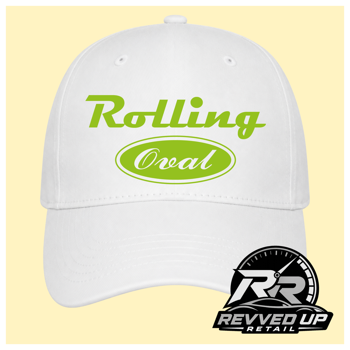 A white baseball cap with green text reading 'Rolling Oval' on the front, shown against a pale yellow background. A Revved Up Retail logo watermark is visible in the bottom right corner.