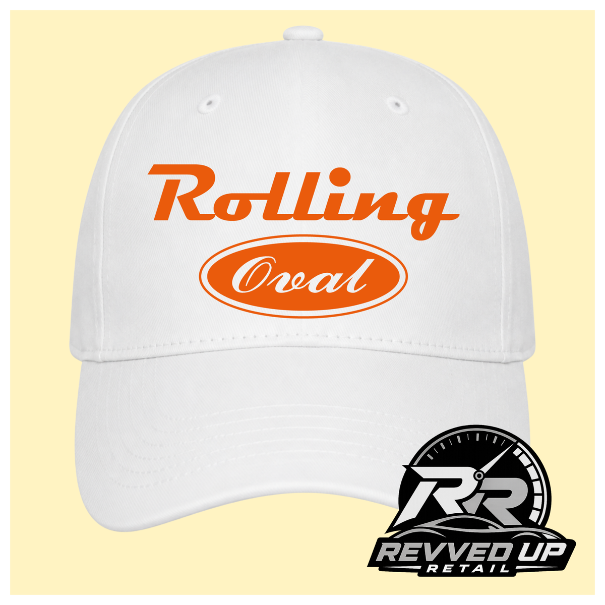 A white baseball cap with orange text reading 'Rolling Oval' on the front, shown against a pale yellow background. A Revved Up Retail logo watermark is visible in the bottom right corner.