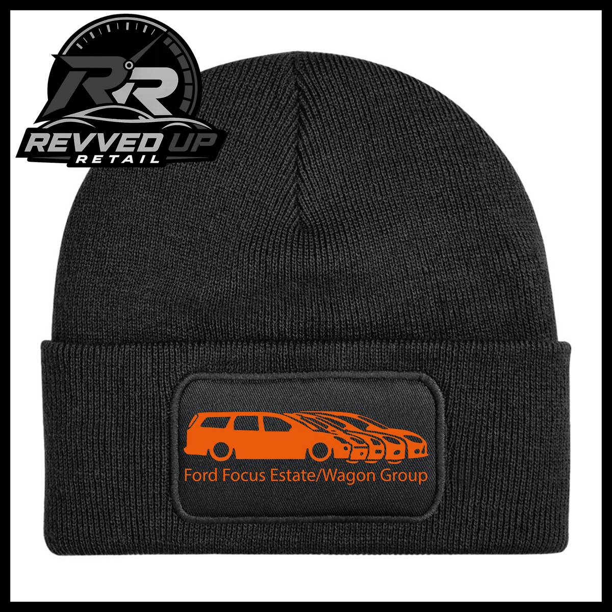 A black ribbed knit beanie with a folded cuff, featuring a black rectangular patch with a orange car graphic and the text 'Ford Focus Estate/Wagon Group.' A Revved Up Retail logo appears in the top-left corner.