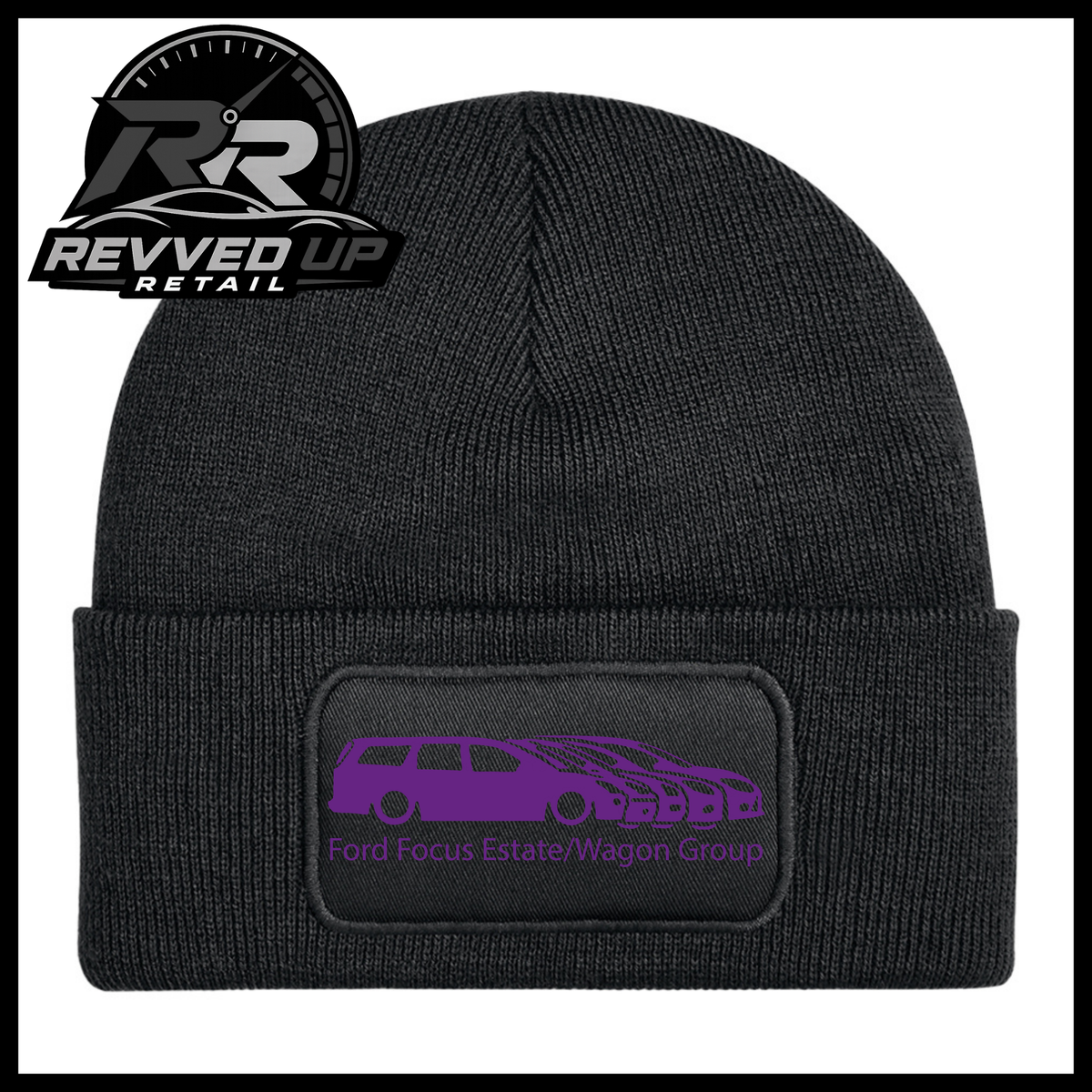 A black ribbed knit beanie with a folded cuff, featuring a black rectangular patch with a purple car graphic and the text 'Ford Focus Estate/Wagon Group.' A Revved Up Retail logo appears in the top-left corner.