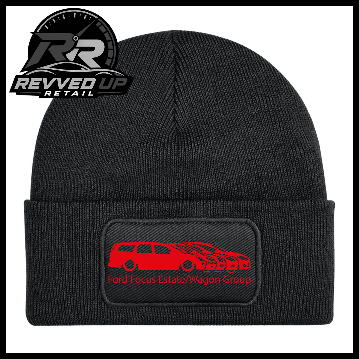 A black ribbed knit beanie with a folded cuff, featuring a black rectangular patch with a red car graphic and the text 'Ford Focus Estate/Wagon Group.' A Revved Up Retail logo appears in the top-left corner.