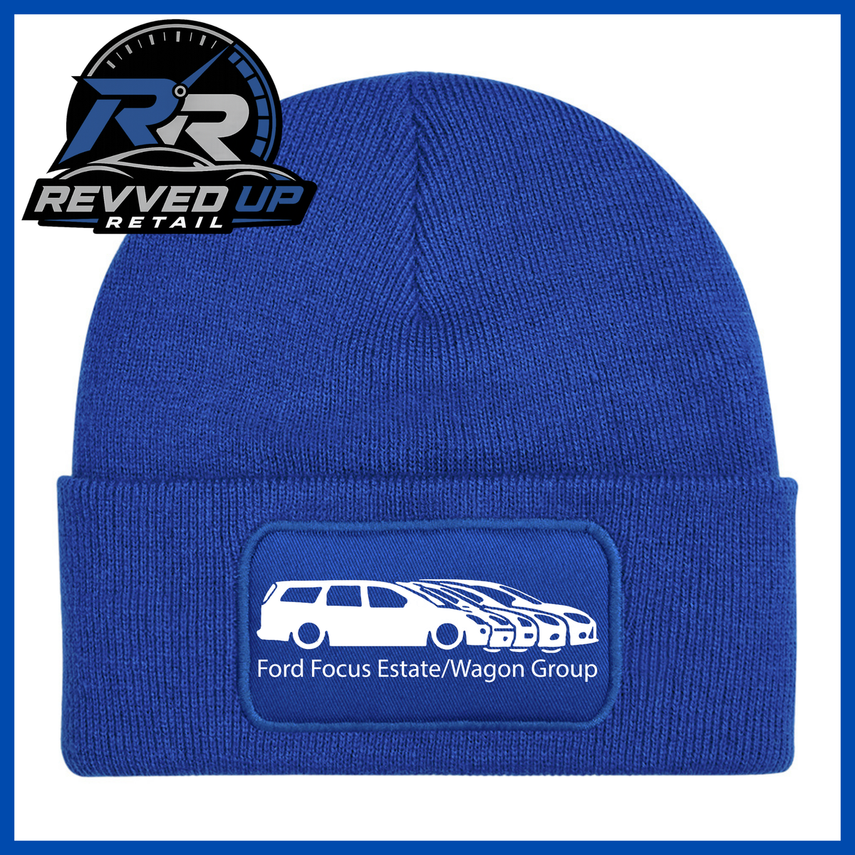 A royal blue knit beanie with a folded cuff featuring a rectangular patch that reads 'Ford Focus Estate/Wagon Group' with a white car graphic. The Revved Up Retail logo is displayed in the top-left corner.
