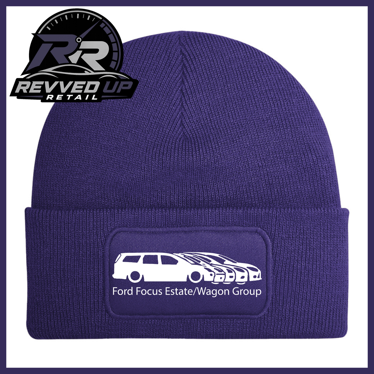 A purple knit beanie with a folded cuff featuring a rectangular patch that reads 'Ford Focus Estate/Wagon Group' with a white car graphic. The Revved Up Retail logo is displayed in the top-left corner.
