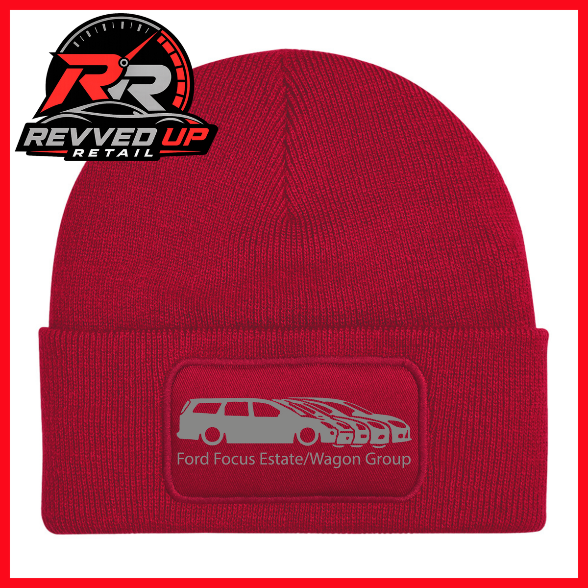 A red knit beanie with a folded cuff featuring a rectangular patch that reads 'Ford Focus Estate/Wagon Group' with a grey car graphic. The Revved Up Retail logo is displayed in the top-left corner.