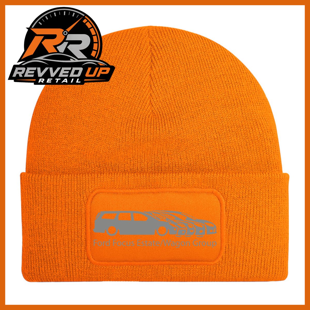 A orange knit beanie with a folded cuff featuring a rectangular patch that reads 'Ford Focus Estate/Wagon Group' with a grey car graphic. The Revved Up Retail logo is displayed in the top-left corner.