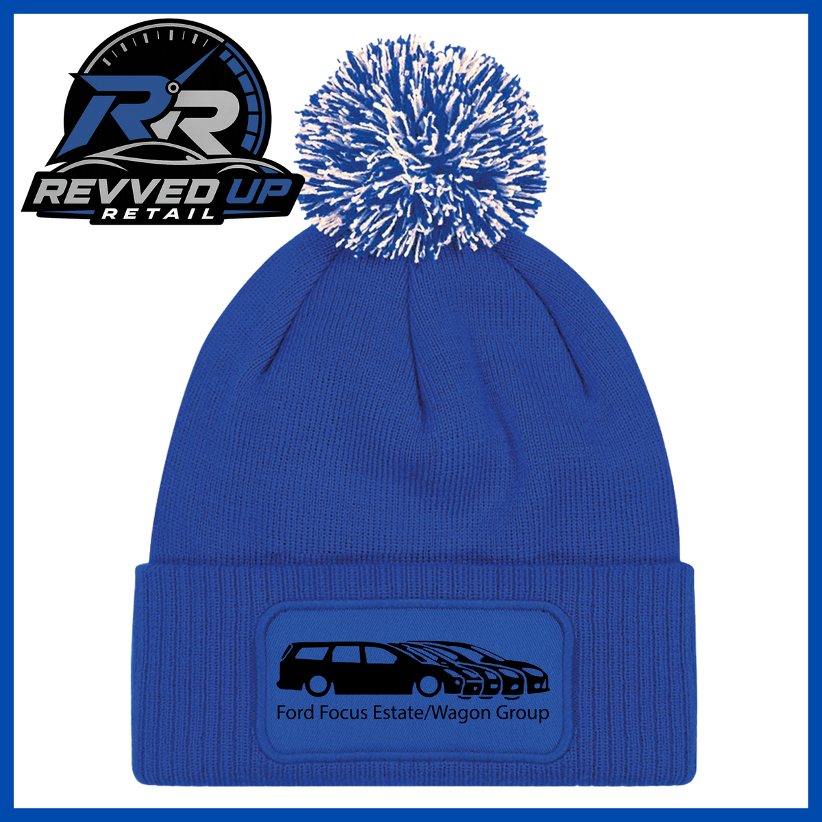 A royal blue knit beanie with a matching blue and white pom-pom. The front cuff features a rectangular patch with a black car silhouette and the text 'Ford Focus Estate/Wagon Group'.