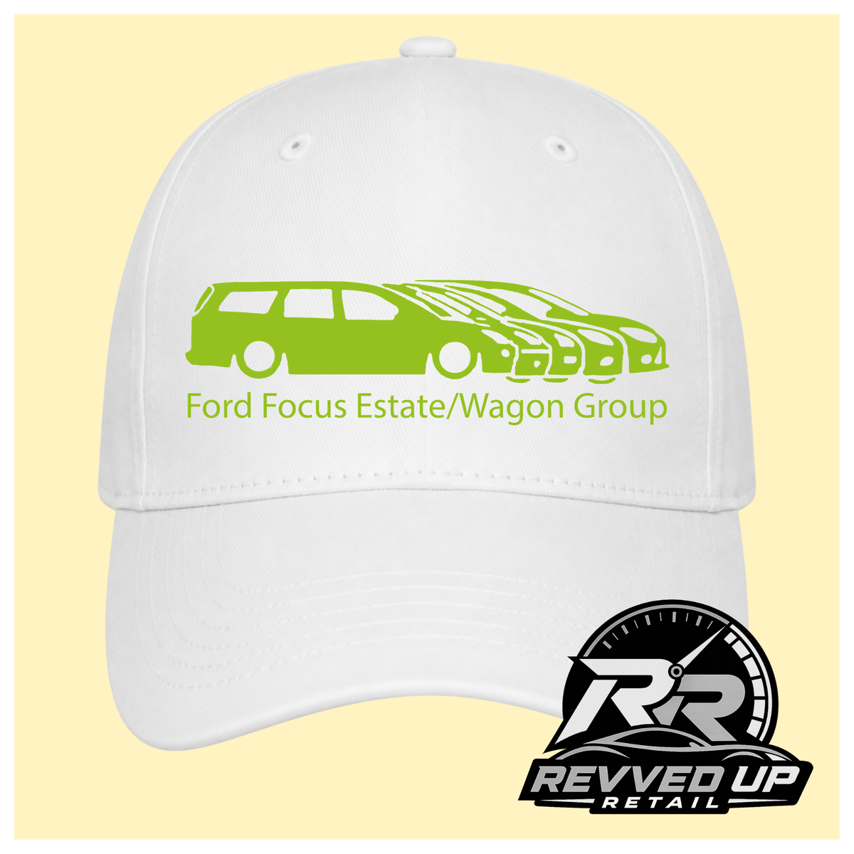 A white baseball cap with a green graphic of a Ford Focus estate and wagon, along with the text 'Ford Focus Estate/Wagon Group'. A 'Revved Up Retail' logo is visible in the bottom right corner.