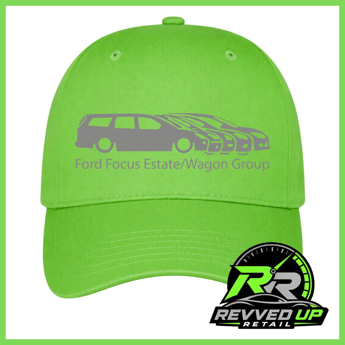 A bright lime green baseball cap with a grey graphic of a Ford Focus estate and wagon, along with the text 'Ford Focus Estate/Wagon Group'. A 'Revved Up Retail' logo is overlaid in the bottom right corner.