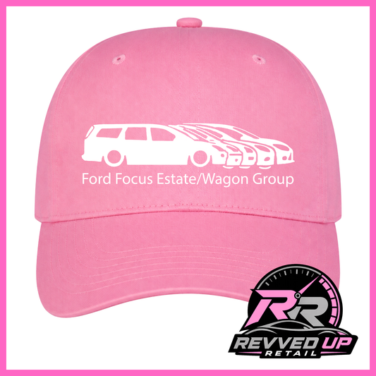 A pink baseball cap with a white graphic of a Ford Focus estate and wagon group, along with the text 'Ford Focus Estate/Wagon Group'. A 'Revved Up Retail' logo is visible in the bottom right corner.