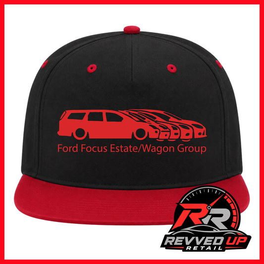 A black and red snapback cap featuring a red graphic of a Ford Focus estate/wagon and the text 'Ford Focus Estate/Wagon Group' on the front. A Revved Up Retail logo is displayed in the bottom right corner.