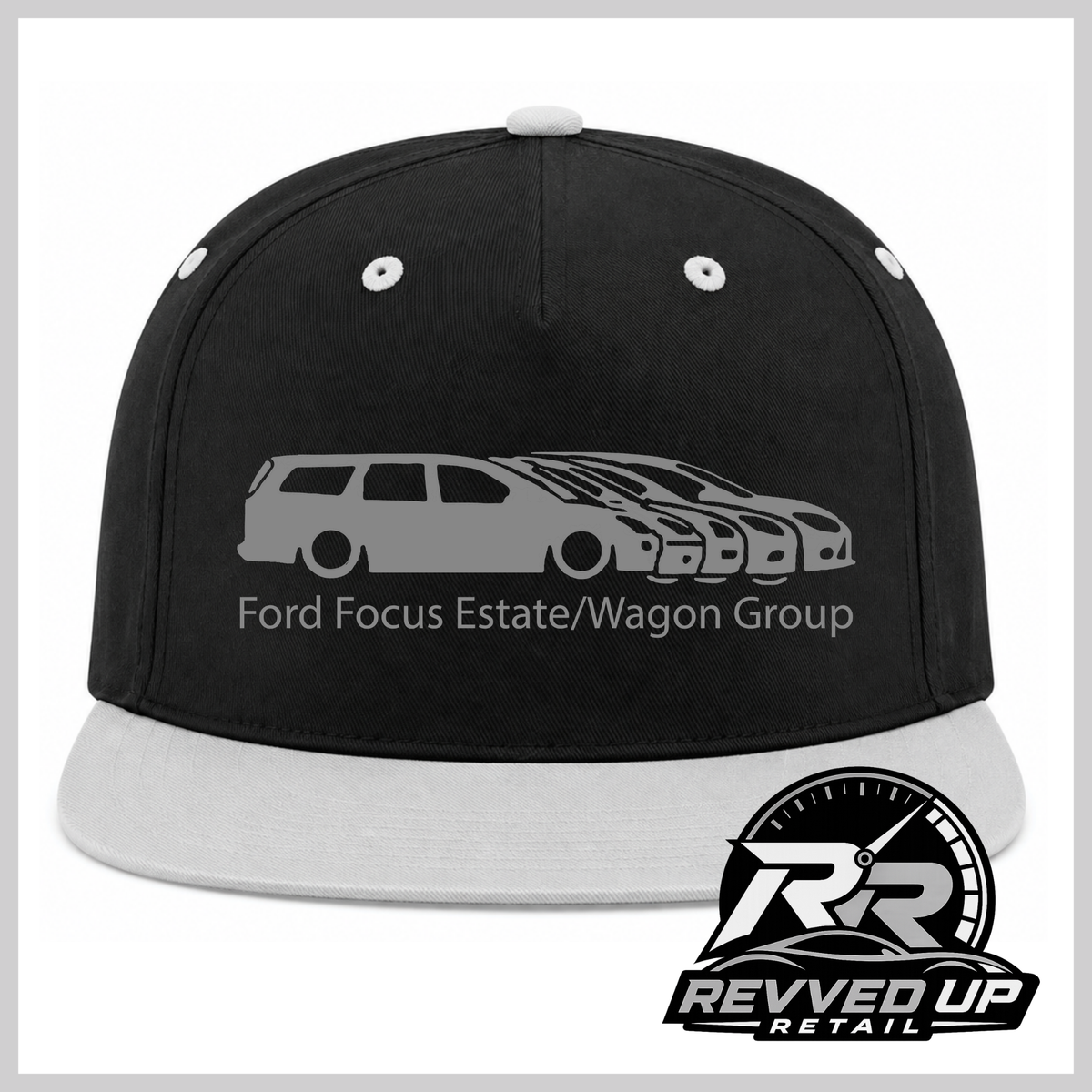 A black snapback cap with a grey flat brim, featuring a grey graphic of a Ford Focus estate/wagon group on the front with the text 'Ford Focus Estate/Wagon Group'. A Revved Up Retail logo is visible in the bottom right corner.