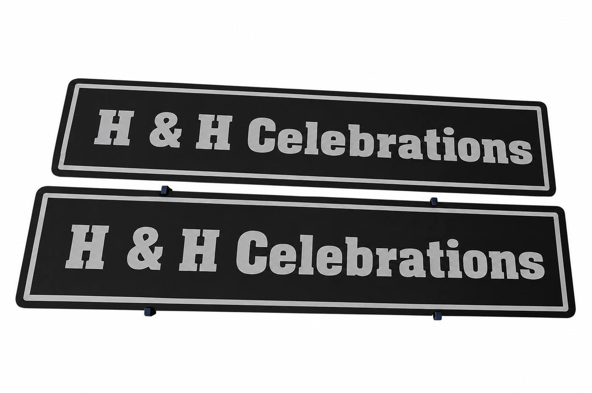 Two rectangular black signs with white borders and the text 'H & H Celebrations' in large white letters, shown on a plain white background.