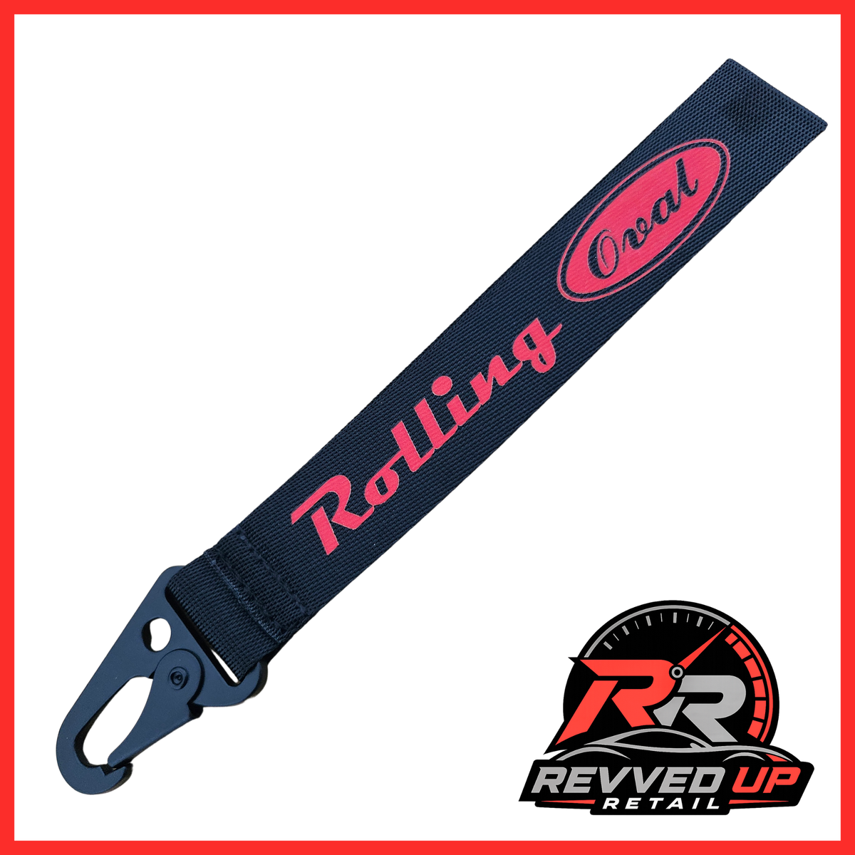 A Rolling Oval brand wristlet strap in black with red printed logos and a black metal carabiner clip, shown on a white background with a Revved Up Retail watermark.