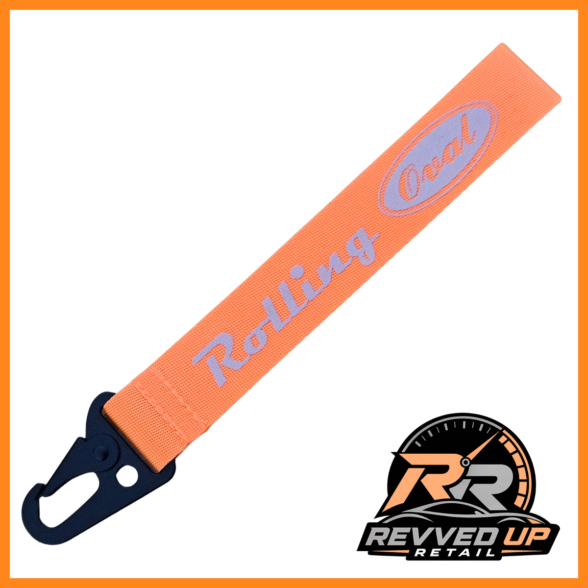 A Rolling Oval brand wristlet strap in orange with grey printed logos and a black metal carabiner clip, shown on a white background with a Revved Up Retail watermark.