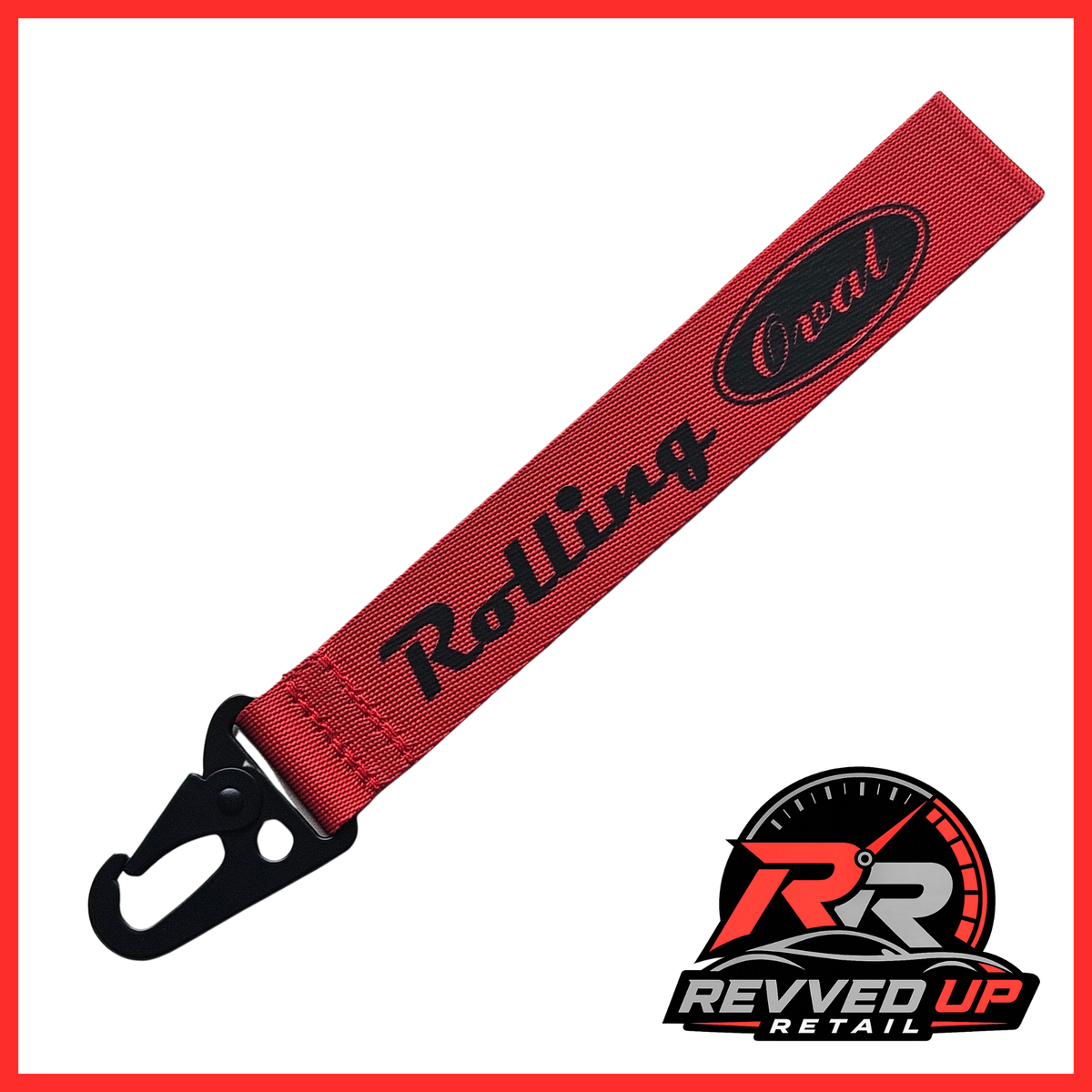 A Rolling Oval brand wristlet strap in red with black printed logos and a black metal carabiner clip, shown on a white background with a Revved Up Retail watermark.