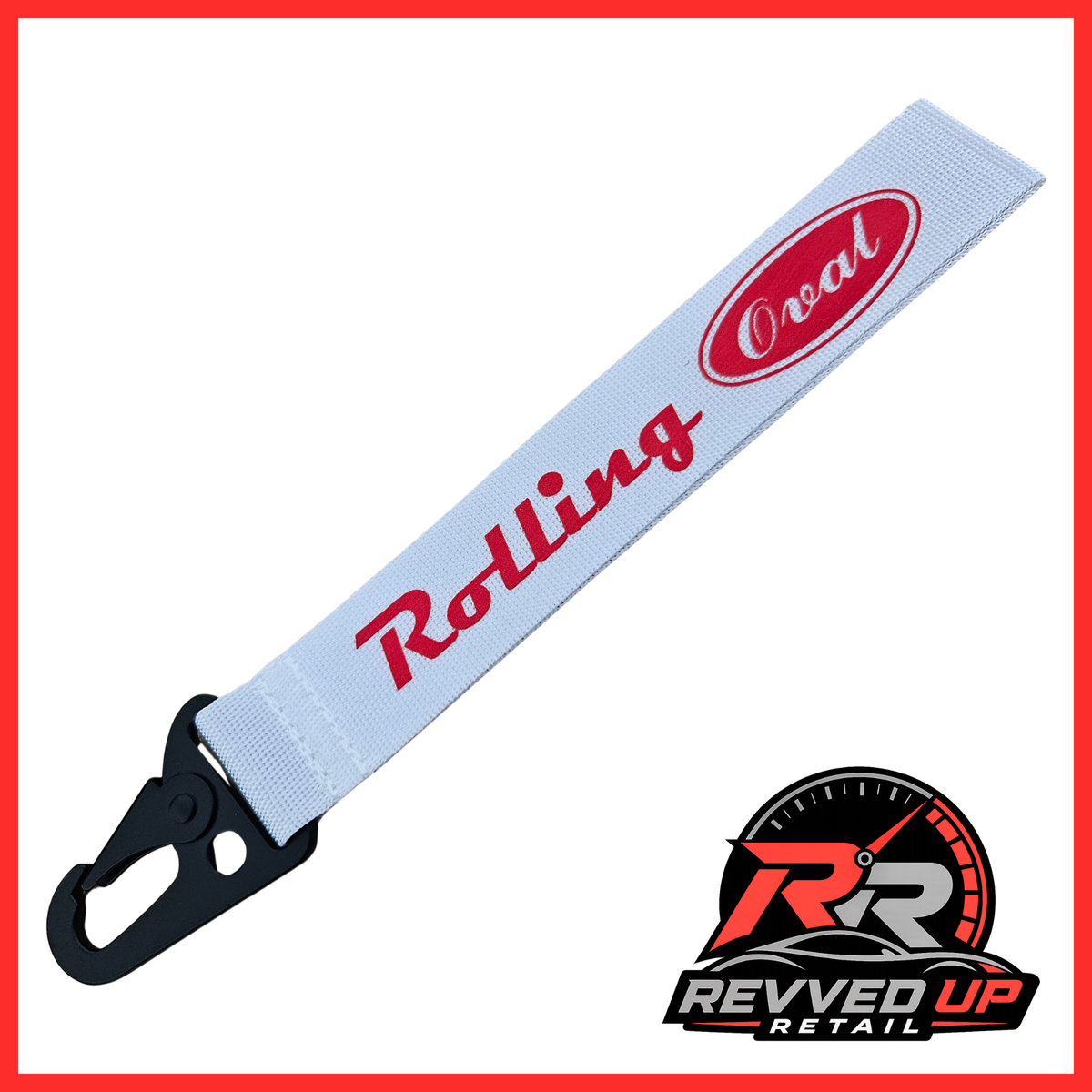 A Rolling Oval brand wristlet strap in white with red printed logos and a black metal carabiner clip, shown on a white background with a Revved Up Retail watermark.
